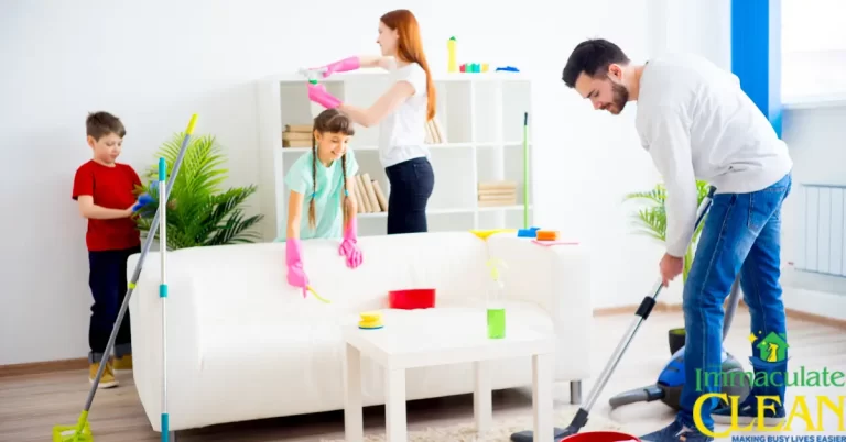 Family engaged in cleaning the living room. | IC