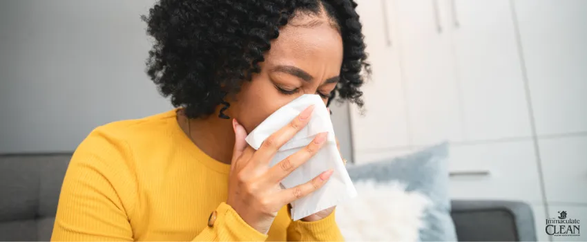 IC -Woman with allergies covering her nose with a handkerchief 