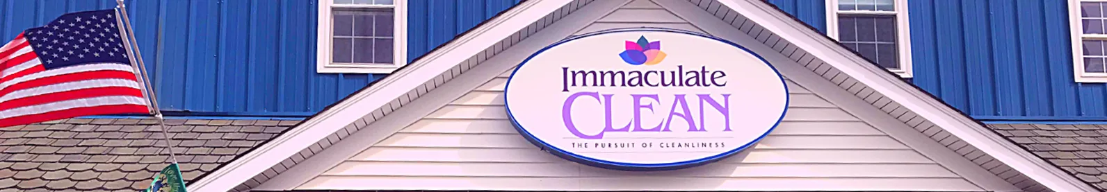 The logo of Immaculate Clean placed on top of their office's entrance.
